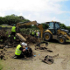 Inspecting remains dug up from the 633 mortar bunker at Stp Langenberg. (Photo: Steve Powell)